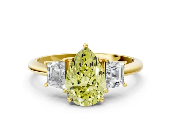 Fancy Yellow Pear Cut Diamond Three-Stone Ring with Trapezoid Side Stones and Prong Setting Yellow gold