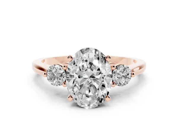 Three-Stone Oval Cut Solitaire Ring with Tapered Band and Four-Prong Setting Rose gold