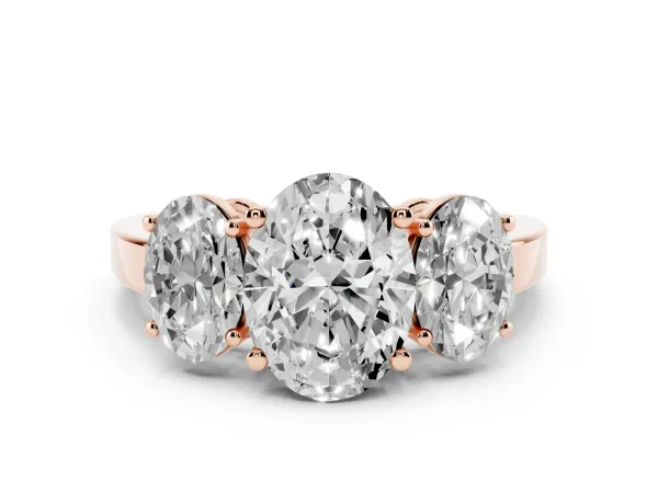 Three-Stone Oval Cut Cut Diamond Engagement Ring with Flat Band and Four-Prong Setting Rose gold