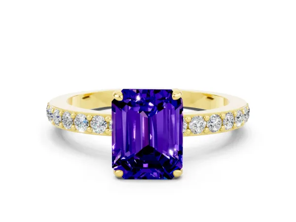 Emerald Cut Tanzanite Solitaire Engagement Ring with Pavé Band and Four-Prong Setting Yellow gold