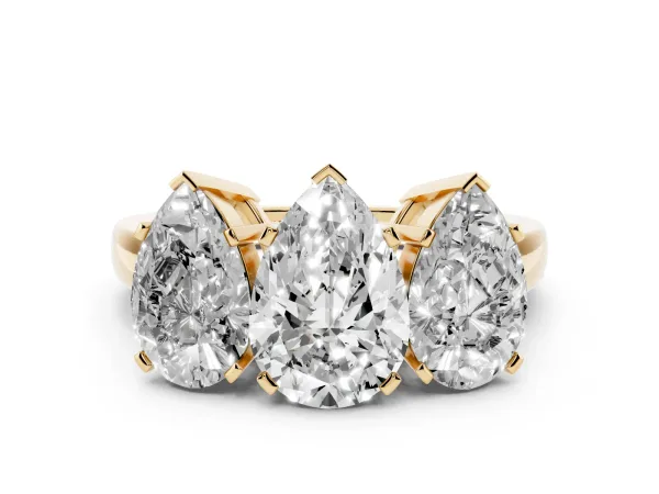 Three-Stone Pear Cut Cut Diamond Ring with Channel Set Band and Four-Prong Setting Yellow gold
