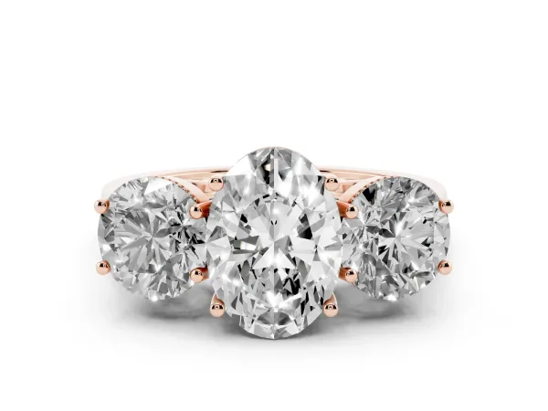Three-Stone Oval Cut Diamond Engagement Ring with Prong Setting on a Classic Band Rose gold