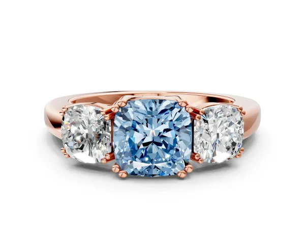 Fancy Blue Three-Stone Cushion Cut Cut Diamond Ring with Channel Set Band and Four-Prong Setting Rose gold