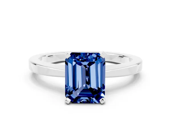 Emerald Cut Blue Sapphire Solitaire Engagement Ring with Classic Band and Four-Prong Setting Silver