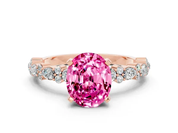 Oval Cut Pink Sapphire Side Stone Solitaire Ring with Round and Four-Prong Setting Rose gold