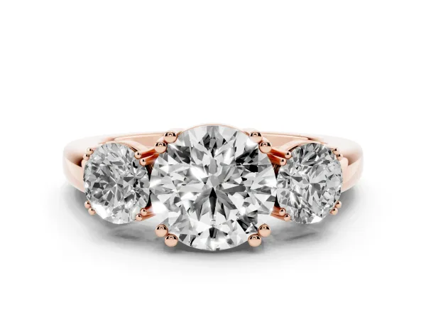 Three-Stone Round Cut Cut Diamond Ring with Channel Set Band and Four-Prong Setting Rose gold