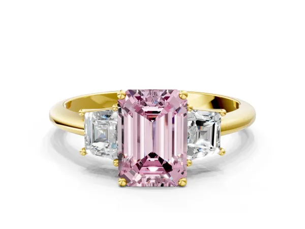 Fancy Pink Emerald Cut Diamond Three-Stone Ring with Trapezoid Side Stones and Prong Setting Yellow gold
