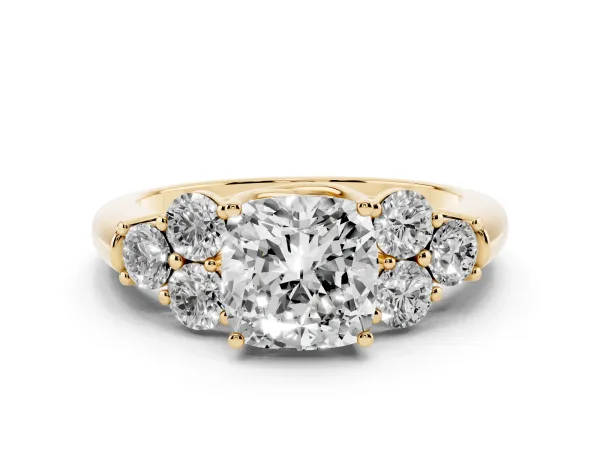Cushion Cut Cut Diamond Cluster Ring with Round Accent Stones and Prong Setting on a Classic Band Yellow gold