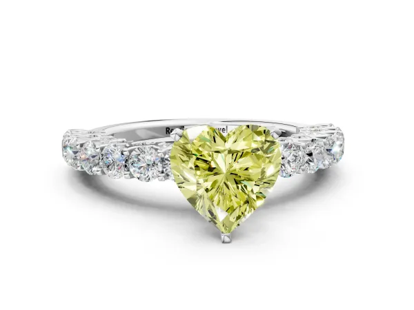 Fancy Yellow Heart Cut Diamond Solitaire Ring with Shared Prong Pavé Band and Four-Prong Setting Platinum