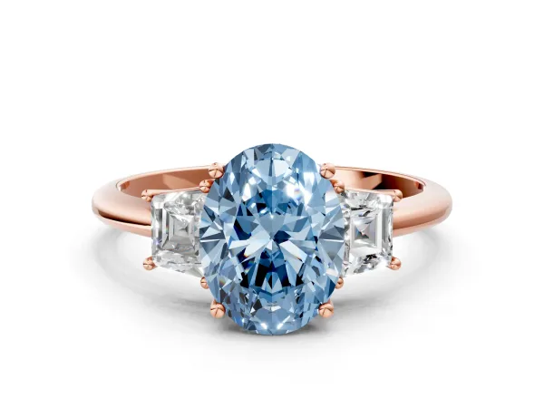 Fancy Blue Oval Cut Diamond Three-Stone Ring with Trapezoid Side Stones and Prong Setting Rose gold