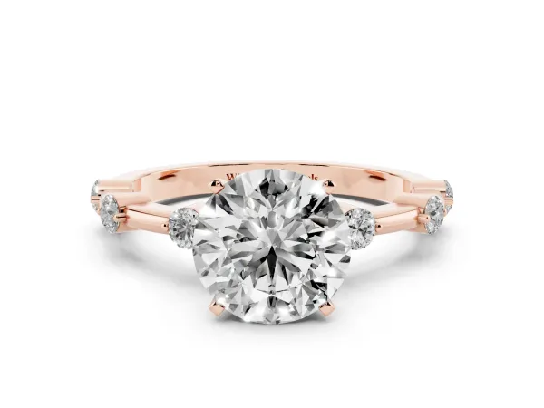 Round Cut Solitaire Diamond Ring with Bezel Set Side Stones and Prong Setting Rose gold