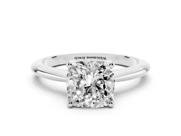 Cushion Cut Cut Solitaire Ring with Four-Prong Setting on a Classic Band White gold