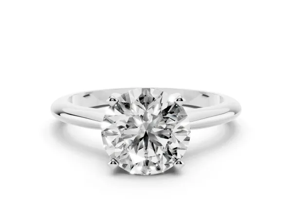 Round Cut Cut Solitaire Ring with Four-Prong Setting on a Classic Band White gold