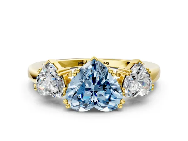 Fancy Blue Three-Stone Heart Cut Cut Diamond Ring with Channel Set Band and Four-Prong Setting Yellow gold
