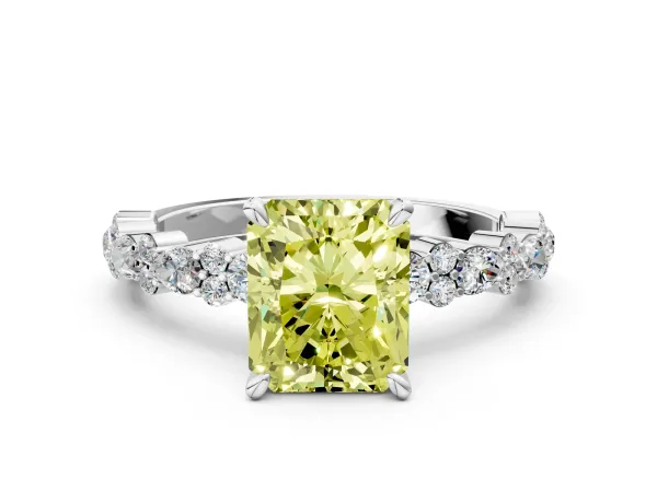 Fancy Yellow Radiant Cut Diamond Side Stone Solitaire Ring with Round and Four-Prong Setting Platinum