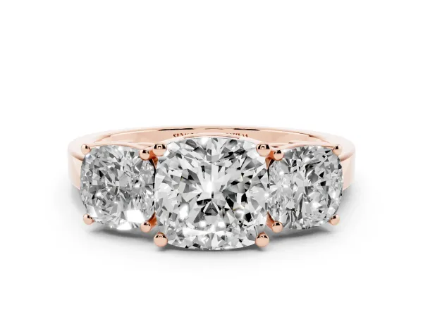 Three-Stone Cushion Cut Cut Diamond Engagement Ring with Flat Band and Four-Prong Setting Rose gold