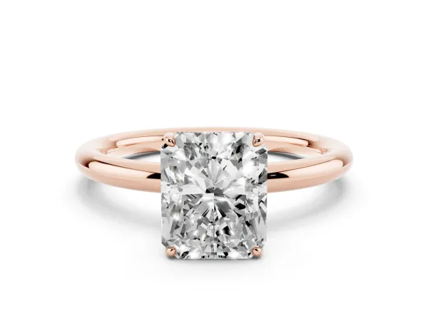 Radiant Cut Solitaire Diamond Ring with Four-Prong Setting on a Plain Band Rose gold