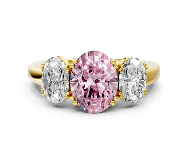 Fancy Pink Three-Stone Oval Cut Cut Diamond Ring with Channel Set Band and Four-Prong Setting Yellow gold