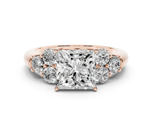 Princess Cut Cut Diamond Cluster Ring with Round Accent Stones and Prong Setting on a Classic Band Rose gold