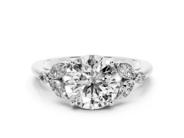 Round Cut Brilliant Cluster Diamond Ring with Marquise and Round Cut Cut Stones on a Classic Band with Four-Prong Setting White gold
