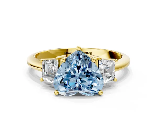 Fancy Blue Heart Cut Diamond Three-Stone Ring with Trapezoid Side Stones and Prong Setting Yellow gold