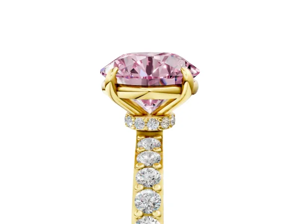 Fancy Pink Round Cut Diamond Solitaire Engagement Ring with Pavé Band and Four-Prong Setting Yellow gold