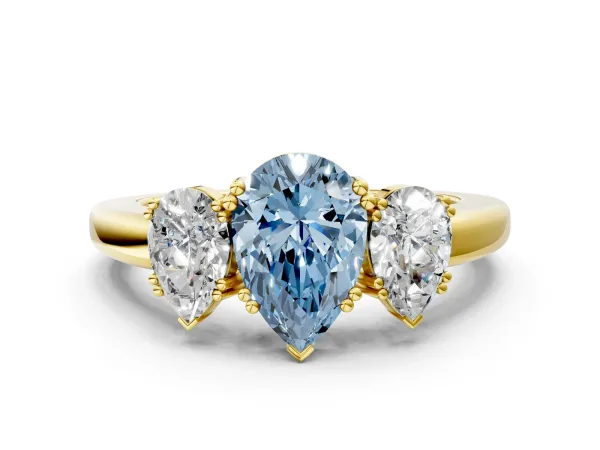 Fancy Blue Three-Stone Pear Cut Cut Diamond Ring with Channel Set Band and Four-Prong Setting Yellow gold
