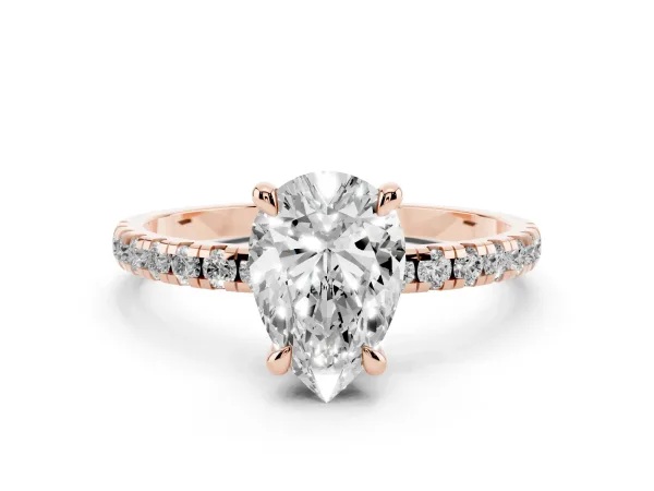 Pear Cut Diamond Brilliant Solitaire Ring with Pavé Band and Four-Prong Setting Rose gold