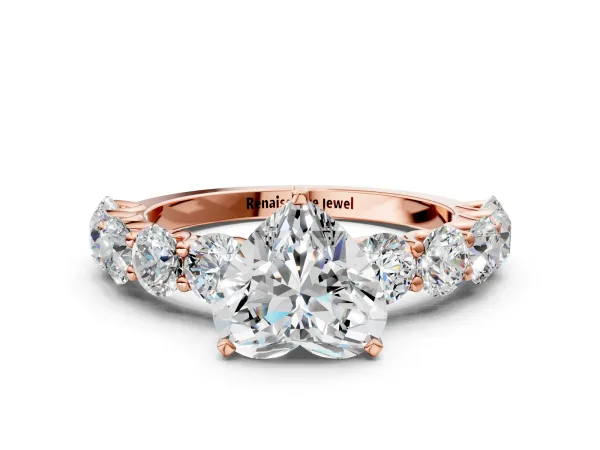 Heart Cut Diamond Prong Setting with Side Stones on a Pave Band Rose gold