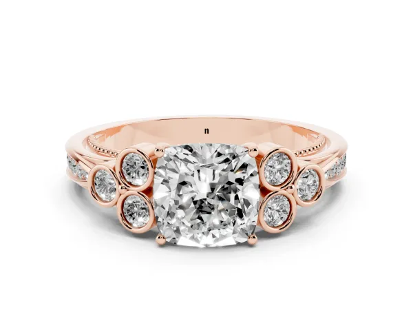 Cushion Cut Cut Diamond Engagement Ring with Bezel Set Round Side Stones and Prong Setting Rose gold