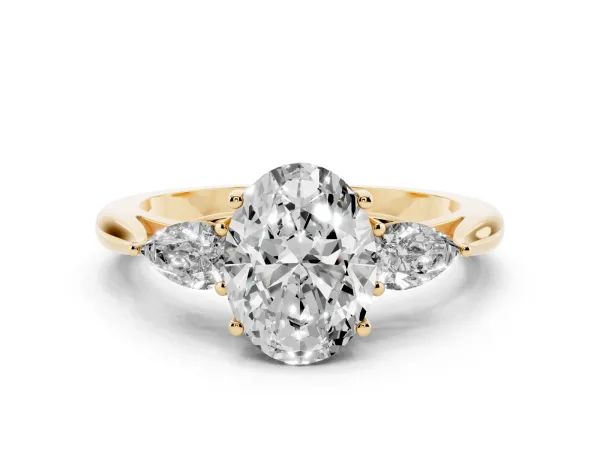 Three-Stone Oval Cut Brilliant Diamond Solitaire Ring with Tapered Band and Four-Prong Setting Yellow gold