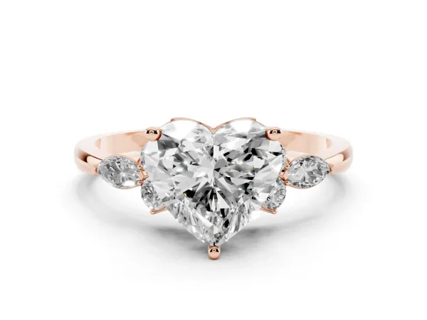 Heart Cut Brilliant Diamond Solitaire Ring with Pear Side Stones and Four-Prong Setting Rose gold