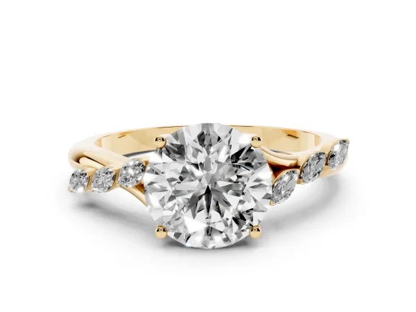 Round Cut Solitaire Diamond Ring with Marquise Side Stones and Prong Setting on a Split Shank Band Yellow gold