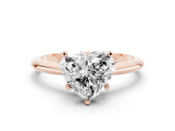 Heart Cut Cut Solitaire Ring with Four-Prong Setting on a Classic Band Rose gold