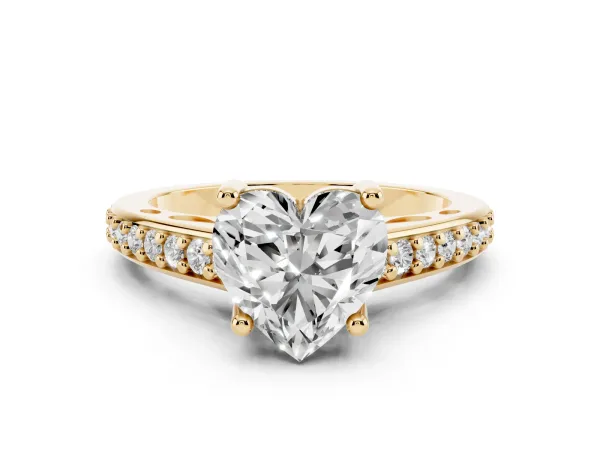 Heart Cut Solitaire Prong Set Diamond Engagement Ring with Pave Band Yellow gold