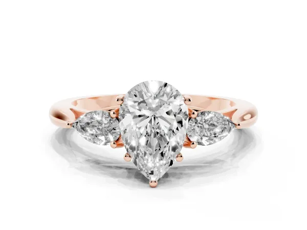 Three-Stone Pear Cut Diamond Ring with Pear Side Stones in Four-Prong Setting Rose gold