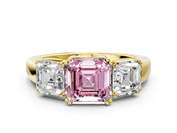Fancy Pink Three-Stone Asscher Cut Cut Diamond Ring with Channel Set Band and Four-Prong Setting Yellow gold
