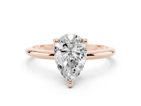 Pear Cut Solitaire Diamond Ring with 4-Prong Setting on a Classic Band Rose gold