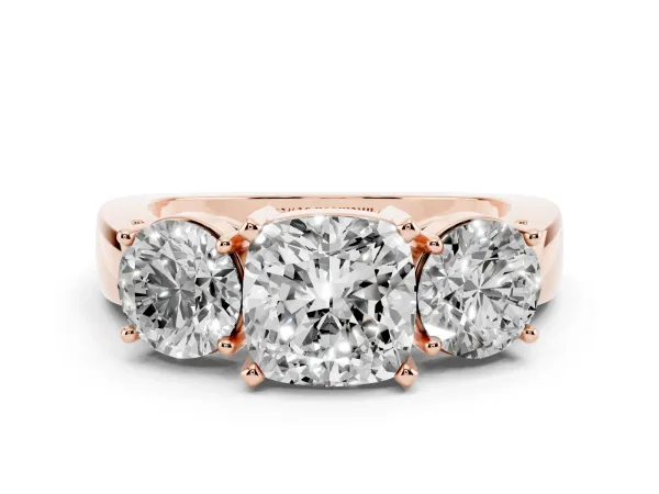 Three-Stone Cushion Cut Diamond Ring with Round Side Stones, Classic Band, and Four-Prong Setting Rose gold