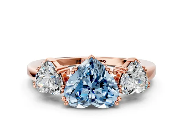 Fancy Blue Three-Stone Heart Cut Cut Diamond Ring with Channel Set Band and Four-Prong Setting Rose gold