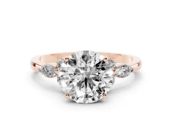 Round Cut Brilliant Diamond Solitaire Ring with Pear Side Stones and Four-Prong Setting Rose gold