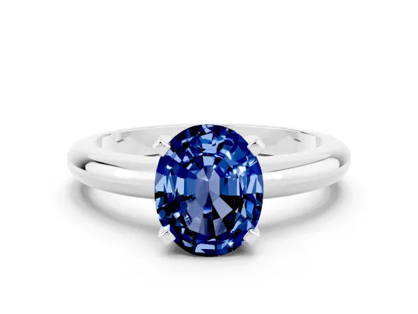Oval Cut Blue Sapphire Solitaire Engagement Ring with Round Band and Four-Prong Setting Silver