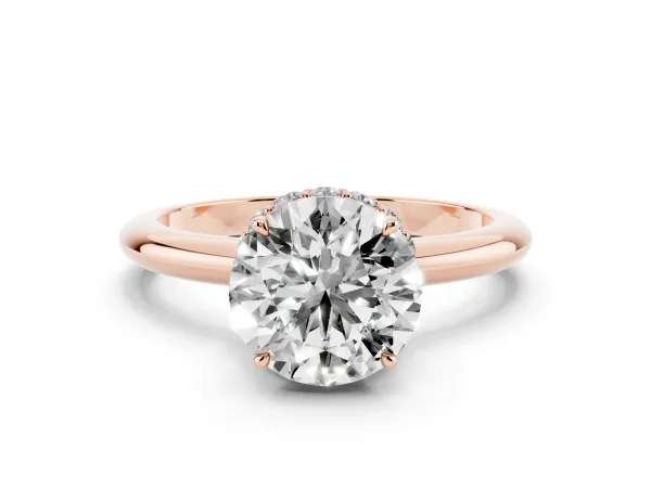 Round Cut Brilliant Solitaire Engagement Ring with Six-Prong Setting and Classic Band Rose gold