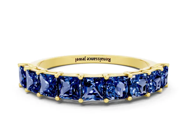 Princess Cut Blue Sapphire Channel-Set Eternity Band with Prong Setting Yellow gold