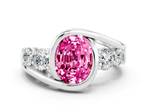 Bezel Set Oval Cut Pink Sapphire Bypass Ring with Round Accents Platinum