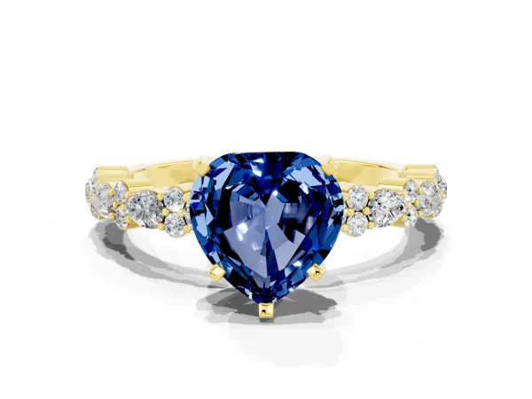 Heart Cut Blue Sapphire Side Stone Solitaire Ring with Round and Four-Prong Setting Yellow gold