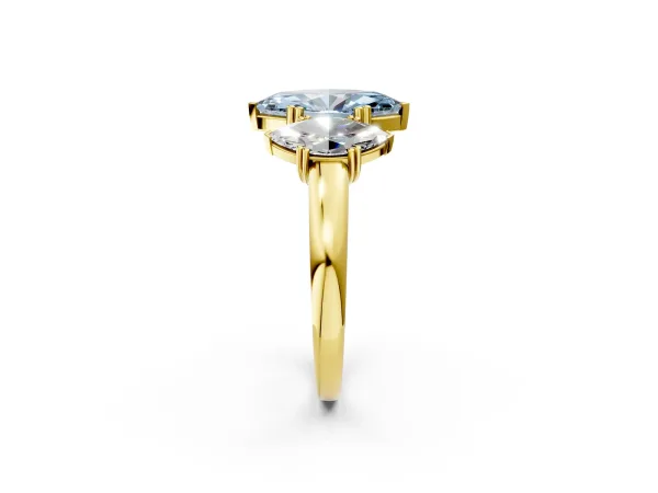 Fancy Blue Three-Stone Marquise Cut Cut Diamond Ring with Channel Set Band and Four-Prong Setting Yellow gold