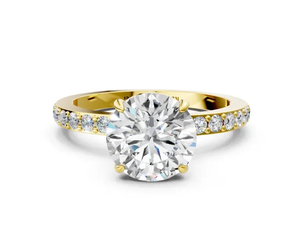 Round Cut Diamond Solitaire Engagement Ring with Pavé Band and Four-Prong Setting Yellow gold