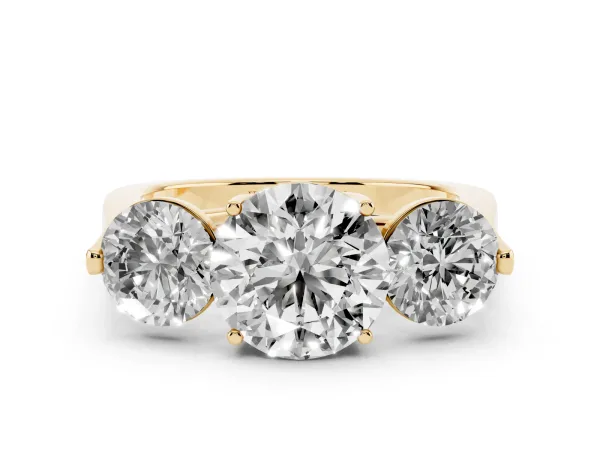 Three-Stone Round Cut Diamond Solitaire with Tapered Band and Four-Prong Setting Yellow gold
