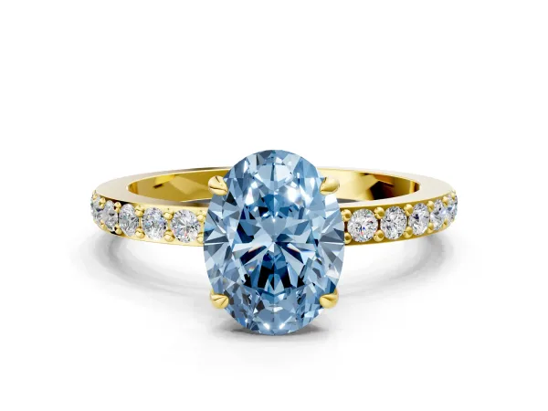 Fancy Blue Oval Cut Diamond Solitaire Engagement Ring with Pavé Band and Four-Prong Setting Yellow gold